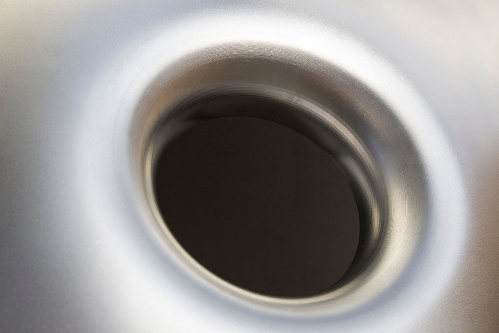 Close-up of the port in a bottom shell