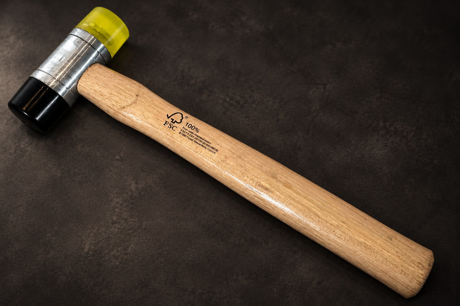 Taxi hammer with wooden handle, black rubber and yellow plastic faces