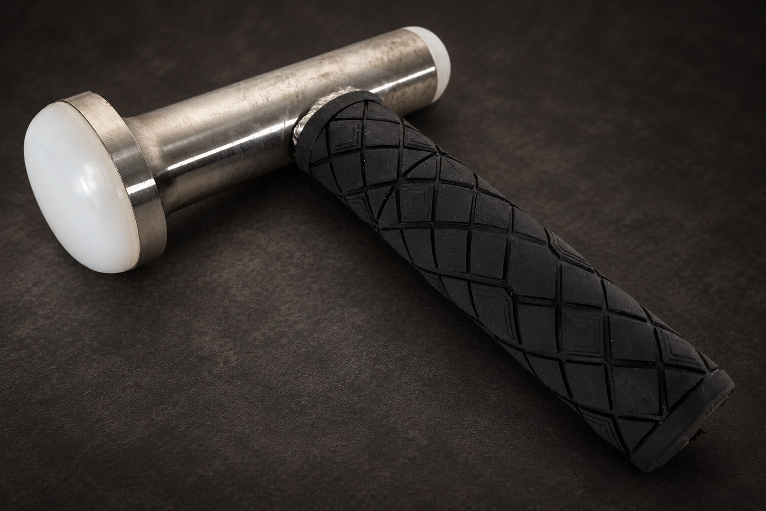 Stainless steel tuning hammer with white nylon heads and rubber grip